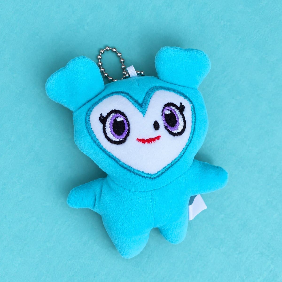 Llavero de peluche Twice carita corazón turquesa - foto 2